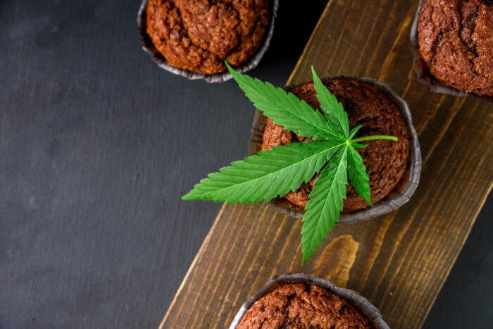 Chocolate muffin with cannabis leaf